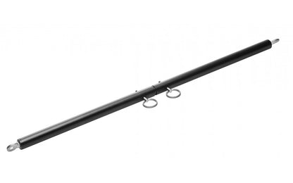 Keep your plaything in place and spread them wide with this darkly sexy spreader bar. Made of durable steel, the bar adjusts between 23 and 35 inches. This black bar has eyebolts securely attached to each end. Wrist and ankle cuffs can be attached to the bar as you desire, making it not only a vital accessory to your bondage play, but a warm welcome to any devious collection.