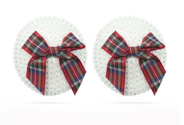 Some kind of Spice Girl, Round White Sequin Pasties, adorned with Tartan Bows. This pair of Gorgeous Pasties are hypoallergenic and come with self adhesive for convenience they have an 8+ Hour wear time and are re-useable! your welcome. To reuse: Simply wash with soap water, Lay sticky side up to air dry. Store it clean for next use.