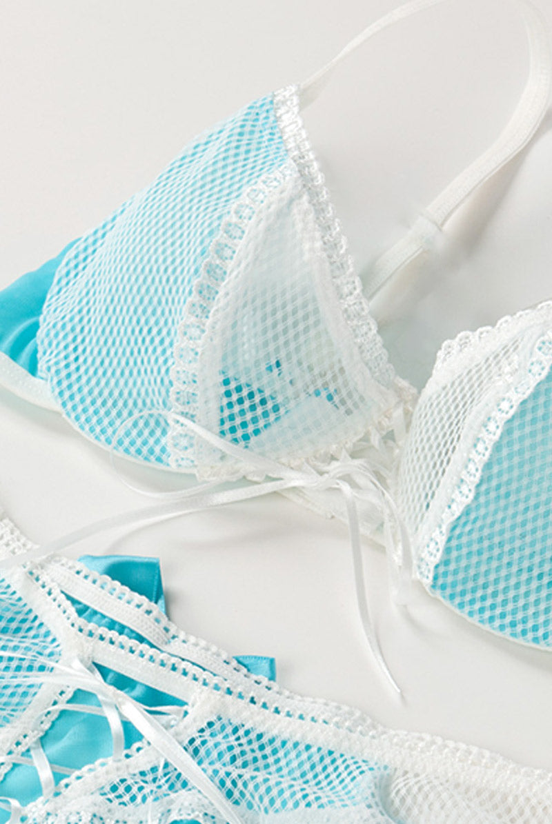 -  Beautiful Blue Adjustable Underwire Bra that leads into a soft white Lace cup. With Ribbon Lace up front adorned with a Floral Lace Edging. Multistage closure for a great fit. - Pantie with Detachable Garter Straps – ready to adjust, with a Lace Floral Trim that matches the Bra. Lace up front and a beautiful blue satin bow. - Nurses Cap with Blue Logo. - Beautiful Detailing on all Pieces.  