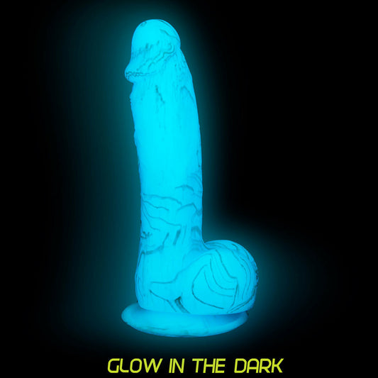 Luke 7.5in Glow in the Dark Dildo w Balls BlueLuke 7.5" Glow in the dark Dildo - Marbled Addiction with suction cap blue Light the way to ultimate pleasure with Luke by Addictions 7.5” silicone glow in the dark dildo. Turn off the lights and experience a glow from within! Easy to find under the sheets this gorgeous marbled glow in the dark dildo is made of premium silicone 100% safe to use on all your most delicate areas as well as smooth against the skin and easy to clean. Thanks to its extreme suction
