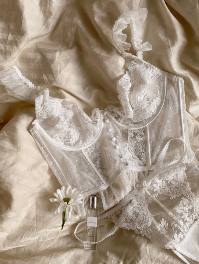 Elegant and feminine this stunning French inspired Two piece set features a soft cup Bralette Camisole, crafted from the most stunning soft floral lace. French Inspired white floral lace lingerie set bralette sheer camisole, Free shipping, afterpay, shop australian lingerie boutique, shop sheer floral lace lingerie white australia.