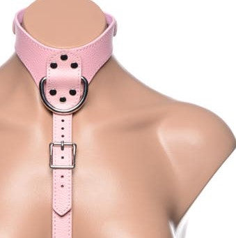 Frisky | Miss Behaved Chest Harness - Pink The Miss Behaved Chest Harness is the perfect combination of sweet and sassy, made with seductive vegan leather and sturdy hardware, but in an innocent shade of baby pink.  The harness is equipped with 4 D-rings that serve as attachment points for other BDSM accessories such as leashes, chains, or ropes. 